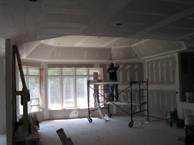 Scaffold Along Stucco Wall - Ontario house by the builder