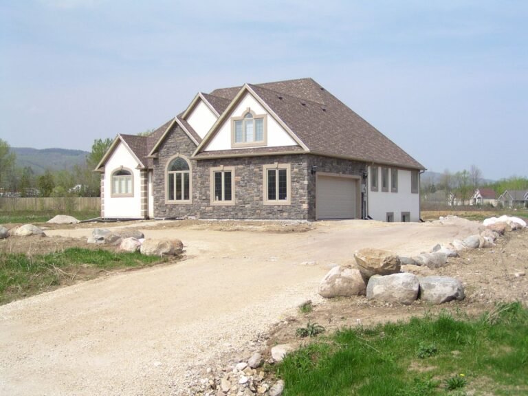 Stone Stucco Two Storey Driveway - Ontario house by the builder